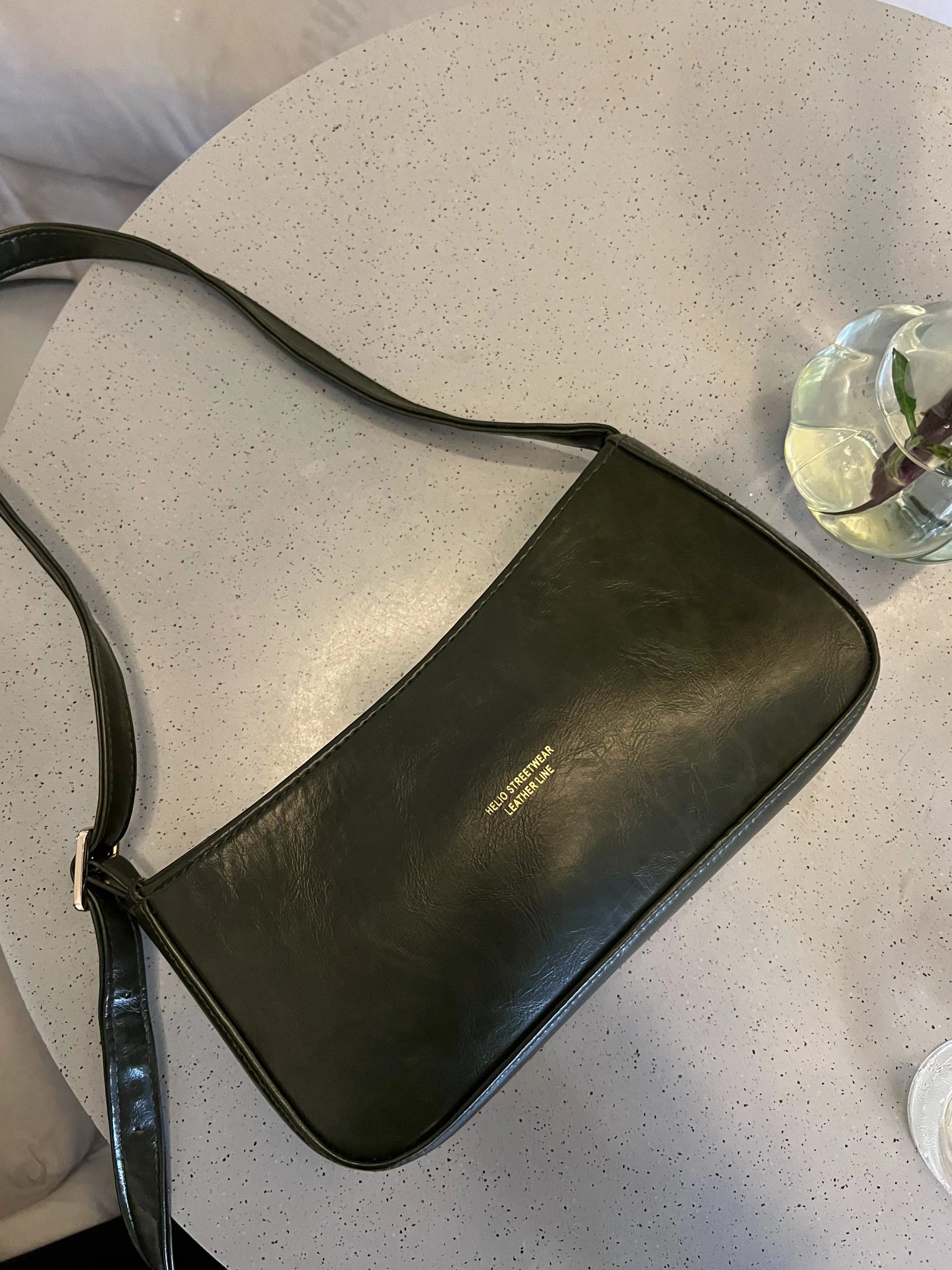 TOKEN LEATHER BAG