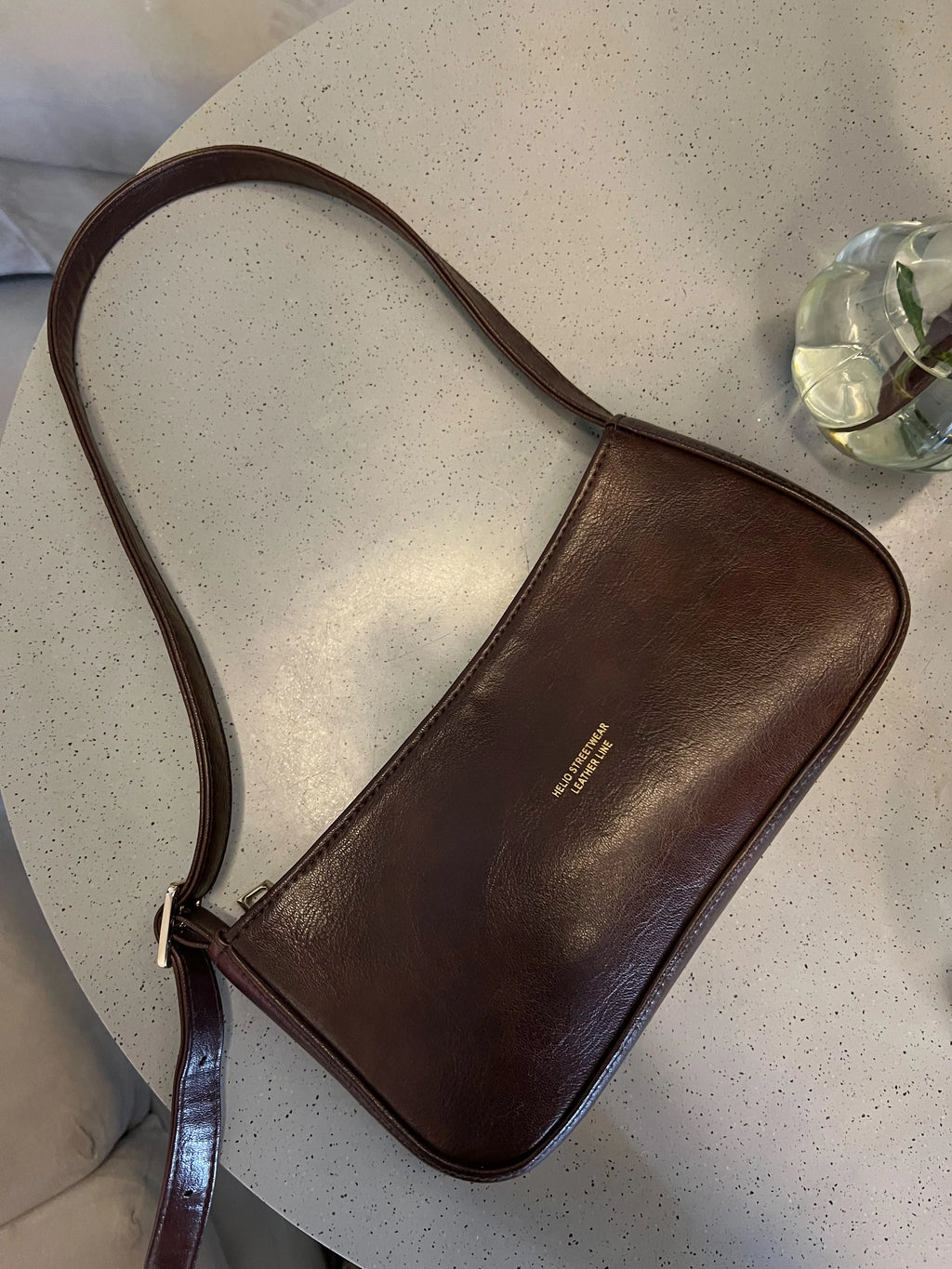 TOKEN LEATHER BAG